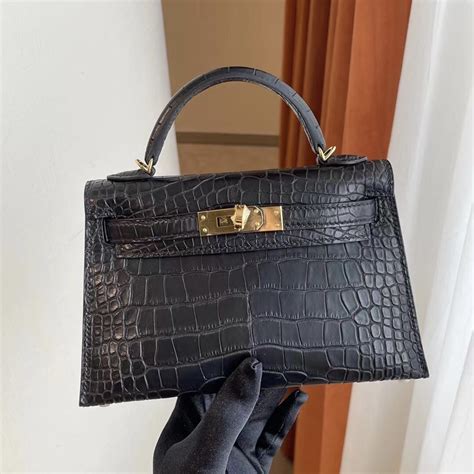 hermes pochette vs mini kelly|Hermes kelly crocodile price.